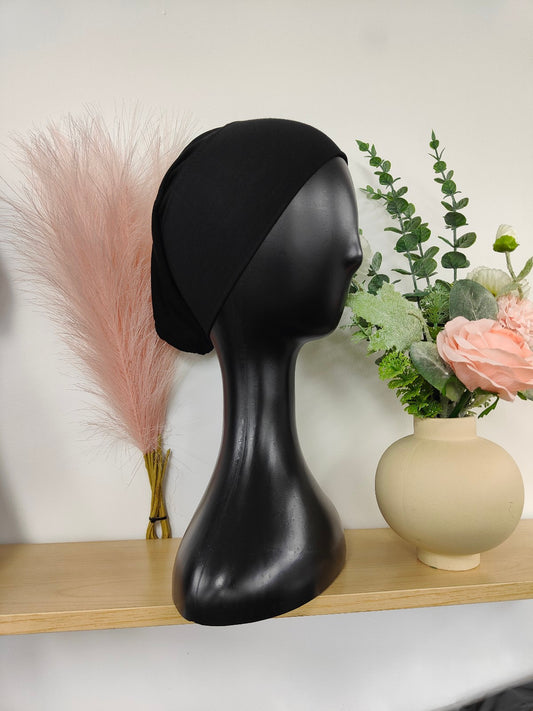 Bamboo Jersey Hijab Bond in Black: The sleek and sophisticated Bamboo Jersey Hijab Bond in Black, exclusively sold by Hikmah Boutique. Designed with both comfort and style in mind, this hijab bond is a must-have for every hijabi.