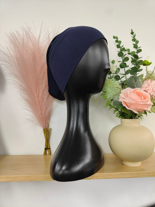 Bamboo Jersey Hijab Bond in Navy, exclusively sold by Hikmah Boutique. This hijab bond is designed for both comfort and style, making it a must-have hijab cap addition for modest clothing.