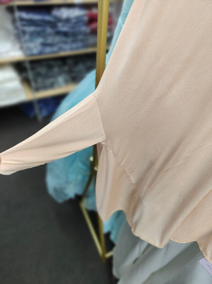 Champagne Cream Bamboo Jilbab at Hikmah Boutique. Lightweight, breathable, and perfect for summer. Bamboo Jilbab for Hot Weather. Buy the best Bamboo Jilbab online. Ideal for hot weather. 