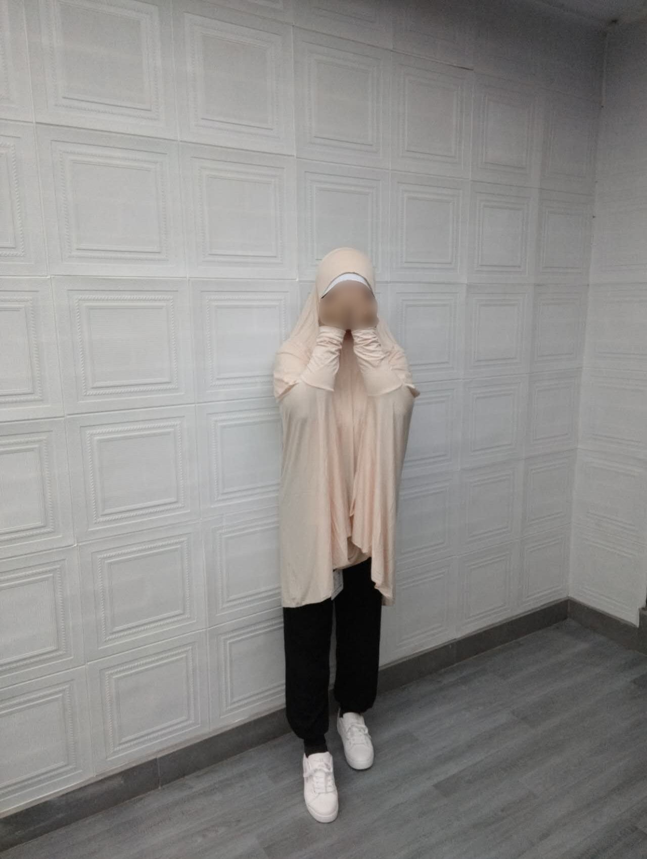 Champagne Cream Bamboo Jilbab at Hikmah Boutique. Lightweight, breathable, and perfect for summer. Bamboo Jilbab for Hot Weather. Buy the best Bamboo Jilbab online. Ideal for hot weather. 