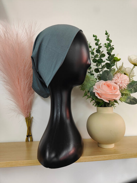 Elevate your modest wardrobe with Bamboo Jersey Hijab Bond in Bluish Grey, exclusively sold by Hikmah Boutique. Designed for both comfort and style, this hijab bond is a versatile and elegant addition to any hijabi's modest collection.