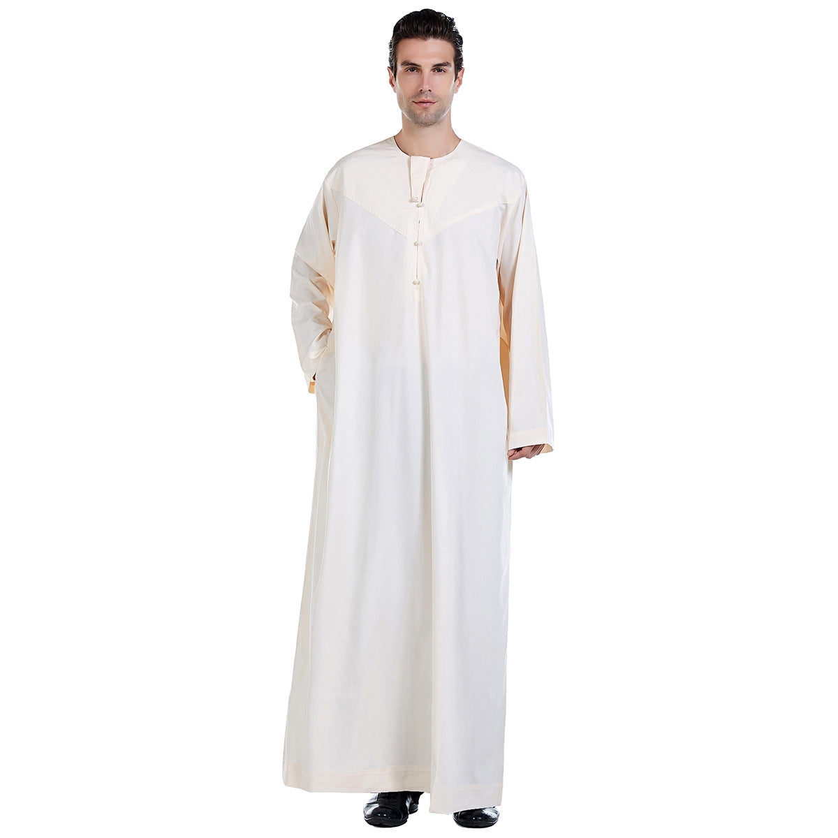Elevate Your Style with the Exquisite Omani Men's Thobe in Cream - Available Exclusively at Hikmah Boutique Introducing the Omani Men's Thobe in Cream, a perfect blend of timeless tradition and contemporary style. At Hikmah Boutique, we take great pride in offering exclusive garments at affordable prices. 