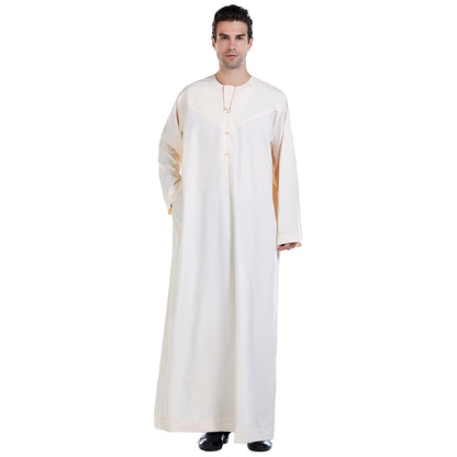 Elevate Your Style with the Exquisite Omani Men's Thobe in Cream - Available Exclusively at Hikmah Boutique Introducing the Omani Men's Thobe in Cream, a perfect blend of timeless tradition and contemporary style. At Hikmah Boutique, we take great pride in offering exclusive garments at affordable prices. 