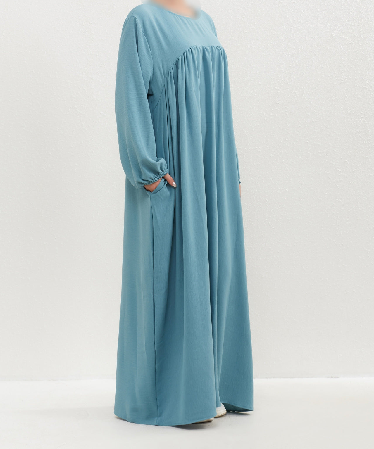 Introducing the Epitome of Modest Clothing: Aqua Crepe Abaya by Hikmah Boutique Elevate your modest wardrobe with the timeless elegance of our Aqua Crepe Abaya, exclusively crafted for the modern Muslim woman who seeks both style and modesty. At Hikmah Boutique, we understand the significance of modest clothing in Islam.