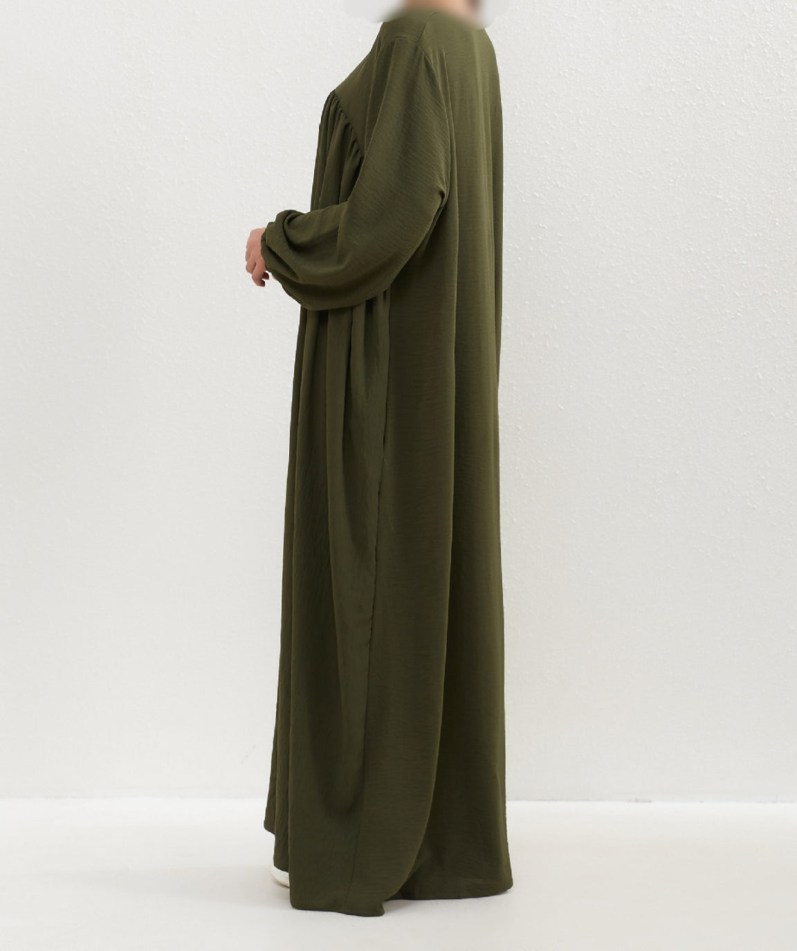 Elevate Your Modest Wardrobe with Timeless Sophistication: Introducing the Olive Green Crepe Abaya by Hikmah Boutique In the realm of modest clothing, Hikmah Boutique proudly presents the Olive Green Crepe Abaya, a unique and exquisite garment designed to fulfill the requirements of modest clothing in Islam.
