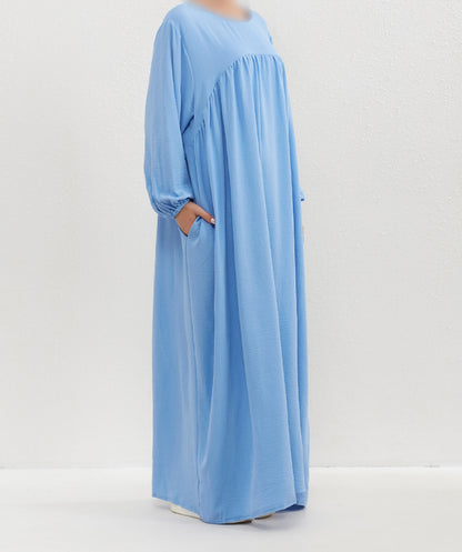 Introducing the Epitome of Modest Elegance: Sky Blue Crepe Abaya by Hikmah Boutique Elevate your modest wardrobe with our exclusive Sky Blue Crepe Abaya, meticulously crafted to embody sophistication, grace, and timeless elegance. At Hikmah Boutique, we understand the significance of modest clothing in Islam.