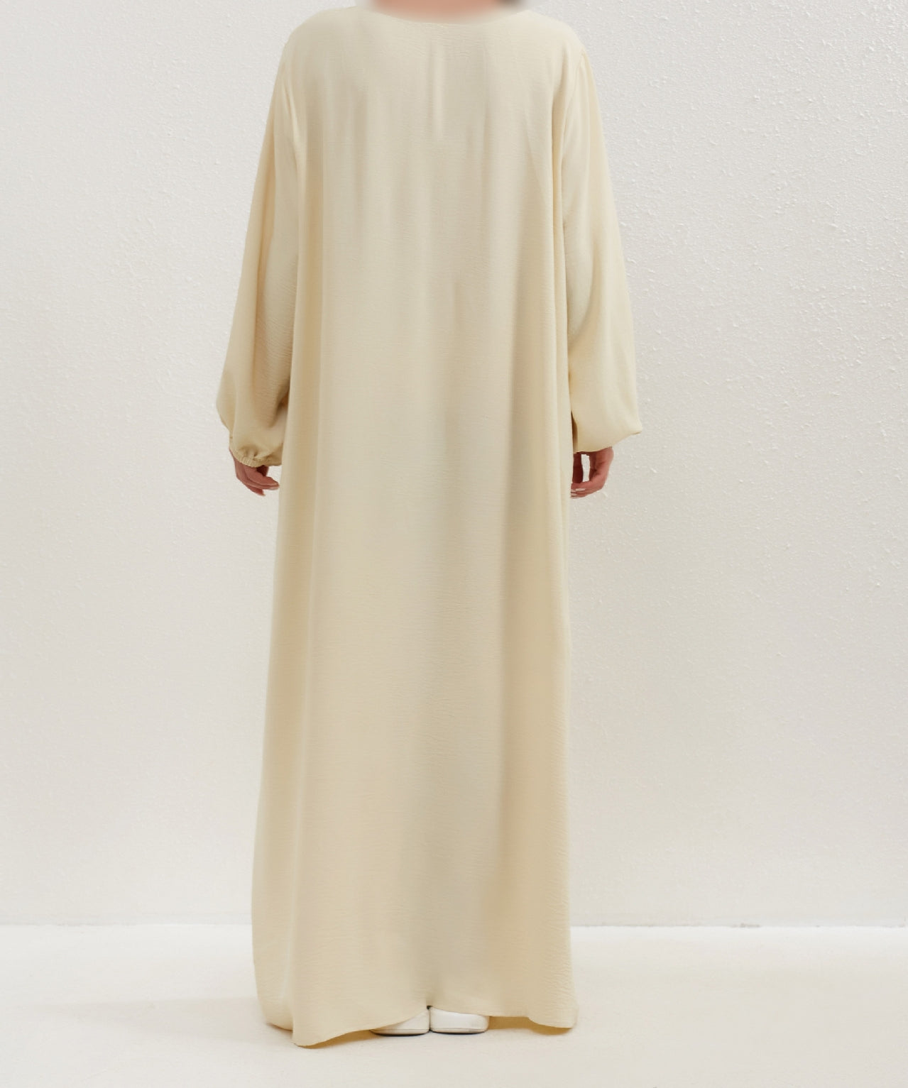 Introducing the Epitome of Modest Elegance: Yellow Vanilla Crepe Abaya by Hikmah Boutique Elevate your modest fashion game with our exclusive Yellow Vanilla Crepe Abaya, meticulously crafted to meet the discerning needs of modern Muslim women. Shop Now at Hikmah Boutique.
