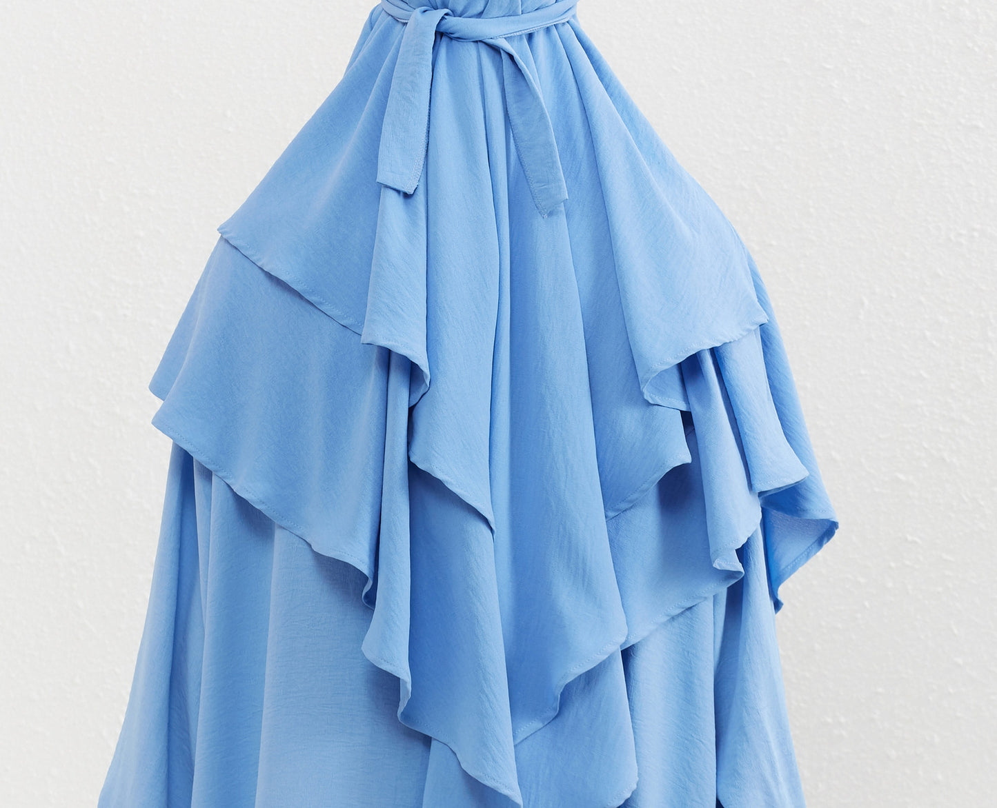 Dive into the serene allure of our Sky Blue Crepe Crinkle Abaya with Double Layer Khimar Set, a celestial creation found exclusively at Hikmah Boutique. Immerse yourself in the tranquility of the sky with this ensemble that seamlessly merges traditional modesty with contemporary elegance.