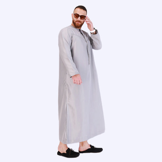 Daffah Emirati Men's Thobe in Light Grey by Hikmah Boutique, a versatile modest abaya for men, effortlessly combines Islamic clothing with muslim clothing style.