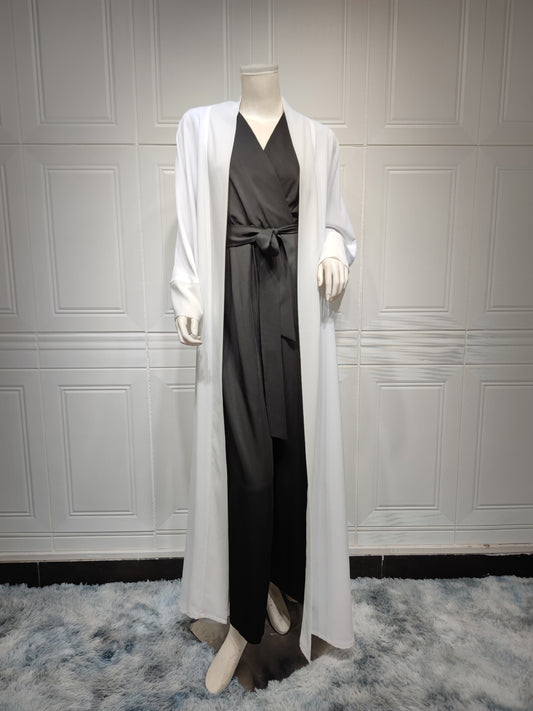 Discover our Kaftan Style Open Abaya in White, a perfect blend of Islamic tradition and Muslim trend. Shop this elegant, modest abaya online at Hikmah Boutique.