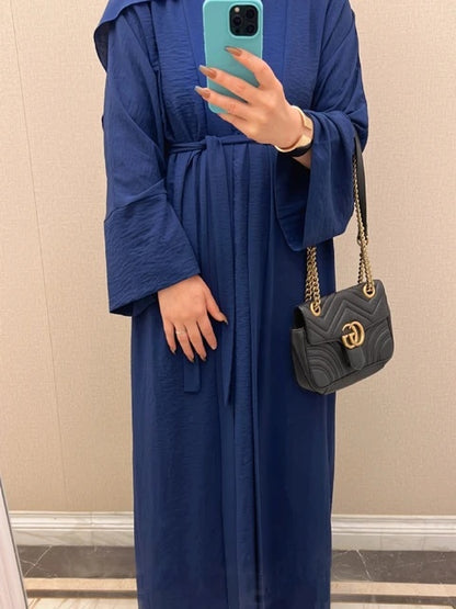 Step into elegance with our exclusive Navy Plain Abaya 3 Piece Set, available only at Hikmah Boutique. Crafted meticulously, each piece embodies sophistication and grace, catering to the discerning tastes of modest clothing enthusiasts.