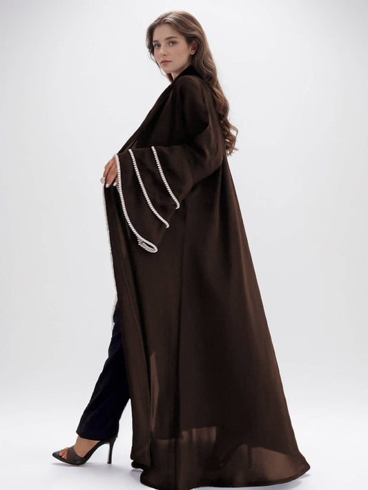 Discover the Plain Open Abaya with Beaded Sleeves in Mocha at Hikmah Boutique. Soft Nida fabric, beaded sleeves, flowy design, and true-to-photo color. Shop now