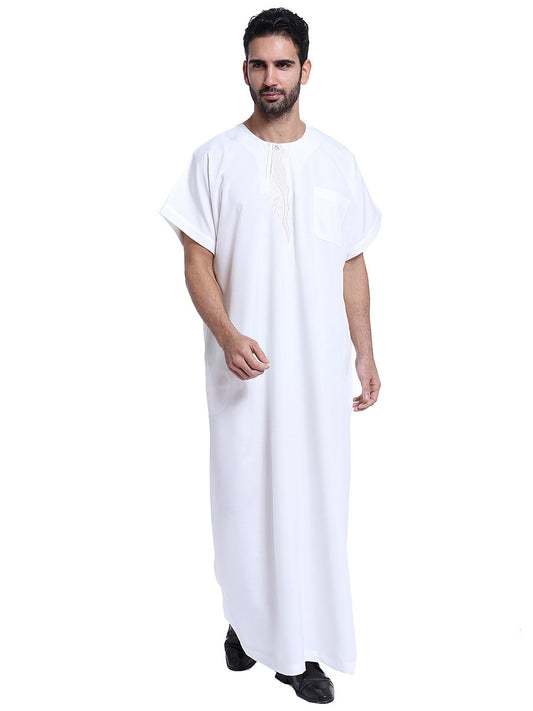 Summer Thobe Saudi Style In White From Hikmah Boutique. Featuring intricate embroidery and comfortable half sleeves, this modest clothing is perfect for everyday wear.