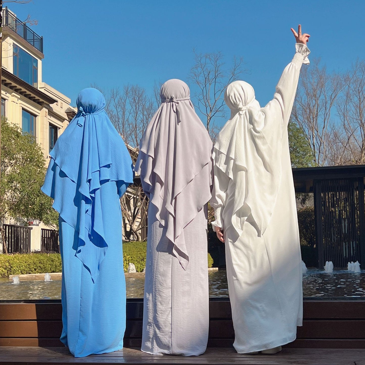 Shop Modest Clothing with our White Crepe Crinkle Abaya with Double Layer Khimar Set, a Timeless Modesty at Hikmah Boutique. Embrace the purity of style with our White Crepe Crinkle Abaya with Double Layer Khimar Set, an embodiment of timeless modesty and sophistication exclusively available at Hikmah Boutique.