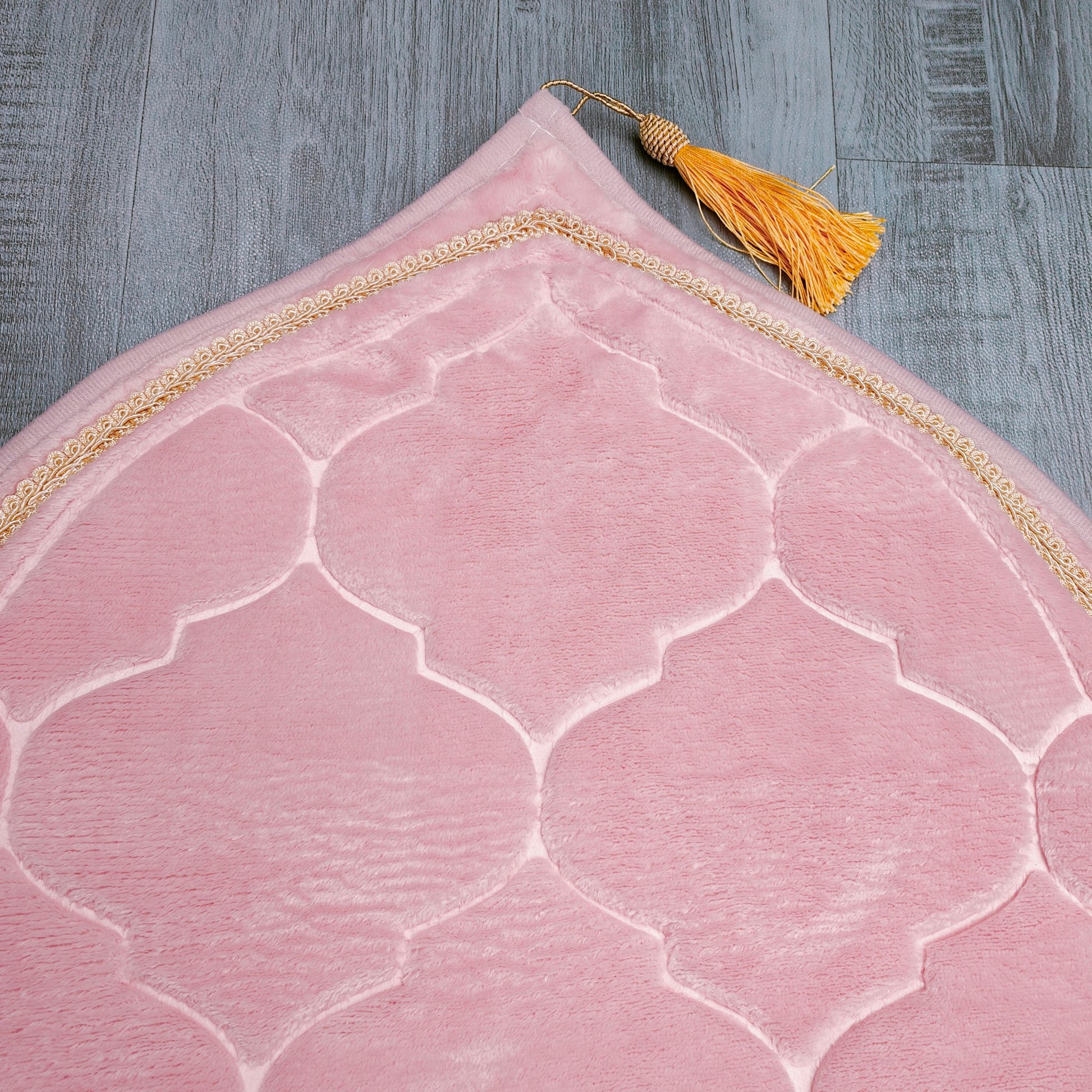 Introducing the exquisite Pink color prayer mat designed by Hikmah Boutique, a masterpiece that adds a touch of elegance and spirituality to your daily prayers. Measuring 110cm by 65cm, this prayer mat is generously sized to provide ample space for you to kneel, bow, and prostrate comfortably. Reasonably Priced.