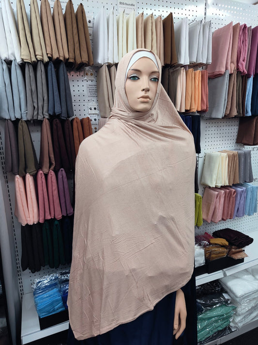 Discover the Apricot Jersey Hijab at Hikmah Boutique. Lightweight, breathable, and non-slip. Available at discounted prices with fast shipping in Australia and worldwide.