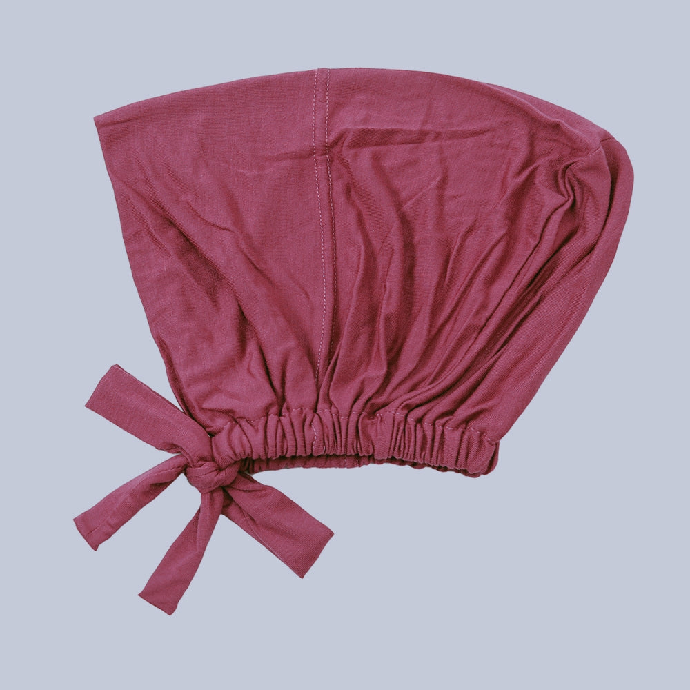 Discover Berry Bamboo Closed Hijab Cap at Hikmah Boutique. Soft, eco-friendly bamboo fabric, with an adjustable tie-back design. Available online and in-store in Sydney, Australia.