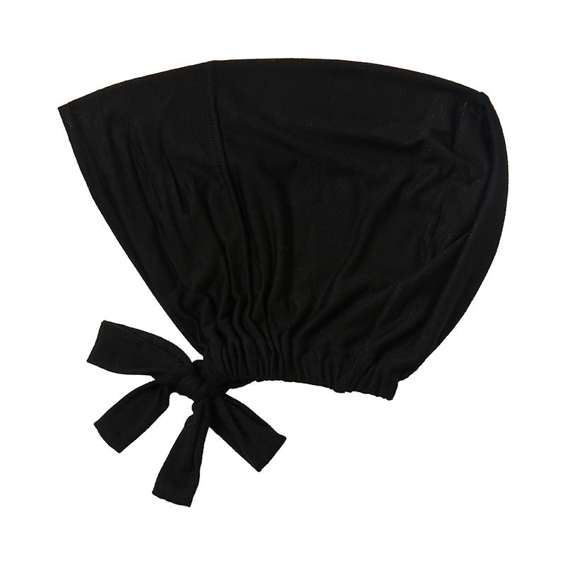 Shop Black Bamboo Closed Hijab Caps at Hikmah Boutique. Soft, moisture-wicking, and anti-odor, with an adjustable tie-back. Pair with Jersey or Modal Hijabs. Buy online or in-store.