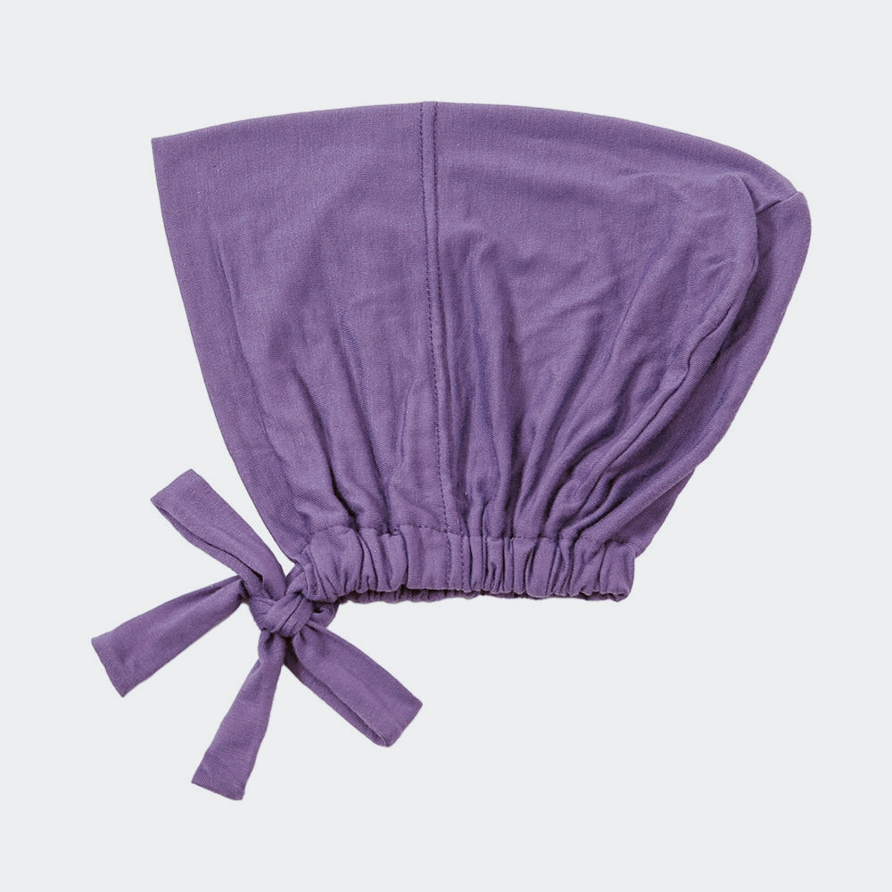 Shop Dusty Lavender Bamboo Closed Hijab Cap at Hikmah Boutique. Soft bamboo fabric, adjustable tie-back. Pair with Modal Hijabs. Available online and in-store in Sydney, Australia.