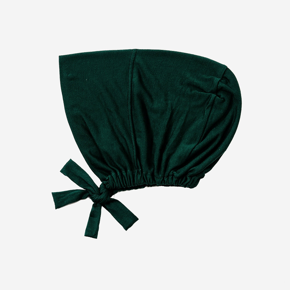 Explore Emerald Green Bamboo Closed Hijab Cap at Hikmah Boutique. Organic bamboo with moisture-wicking and anti-odor benefits. Shop now online or in-store!