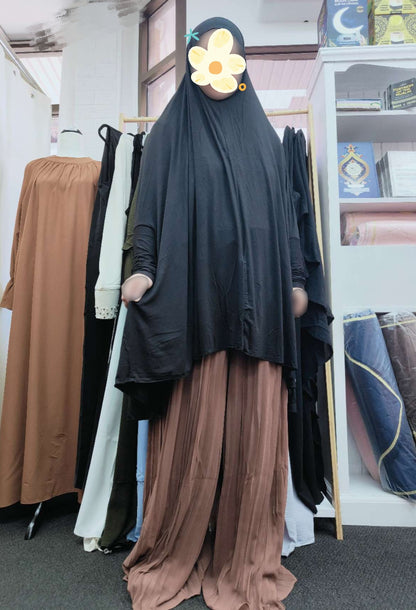 Elevate your modest style with the exclusive Pure Bamboo Jilbab in Black, available only at Hikmah Boutique. Discover timeless elegance, sustainable Islamic fashion, and the perfect balance of modesty, tradition and contemporary sophistication a Hijabi.