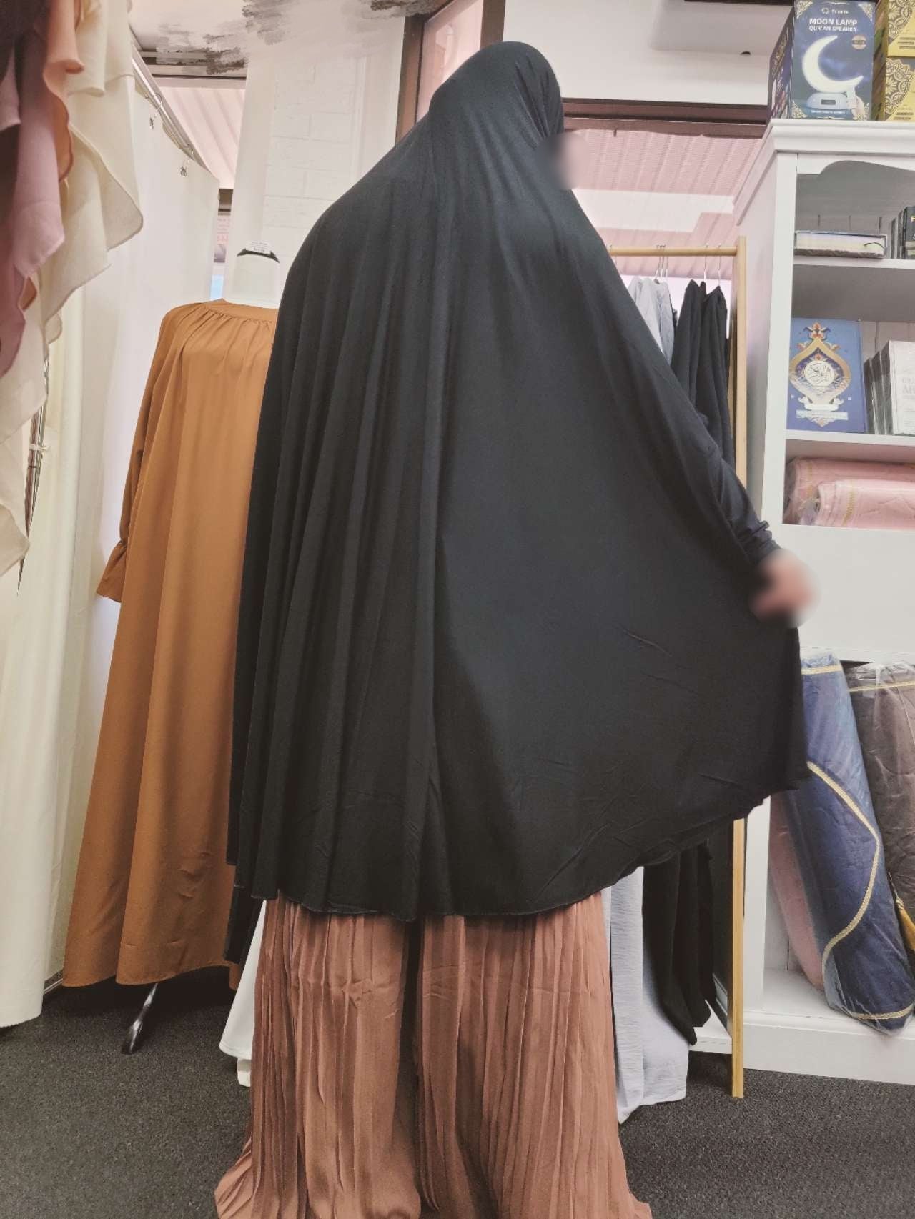 Elevate your modest style with the exclusive Pure Bamboo Jilbab in Black, available only at Hikmah Boutique. Discover timeless elegance, sustainable Islamic fashion, and the perfect balance of modesty, tradition and contemporary sophistication a Hijabi.