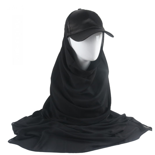 Black Satin Baseball Cap with Chiffon Hijab available at Hikmah Boutique. This unique and stylish piece seamlessly combines the casual flair of a classic baseball cap with the elegance of a chiffon hijab, creating a fashion-forward accessory that caters to the diverse needs of the modern Muslim woman. 