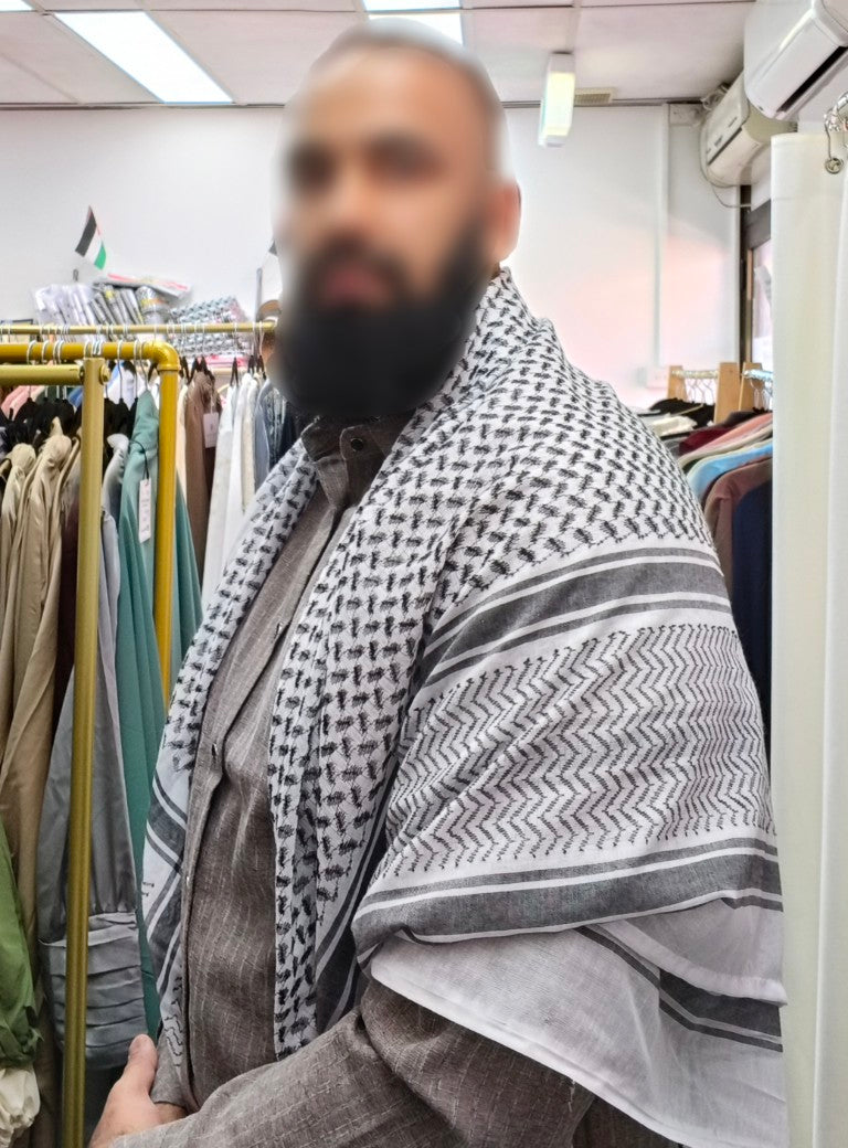 Elevate your style with Hikmah Boutique's Exclusive Black Keffiyeh Scarf Collection. Discover timeless tradition and contemporary fashion with our meticulously crafted scarves, including Black Shemagh options. Explore Best Quality Black Shemagh for men and women. Shop now for Palestinian heritage at Hikmah Boutique.