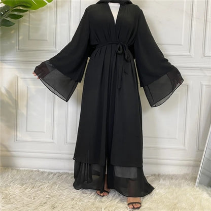 Elevate your modest fashion with our Black Open Abaya With Hijab. Impeccably designed from premium chiffon, this designer abaya offers versatility and elegance. Available in various sizes. Discover the epitome of Islamic fashion at Hikmah Boutique.