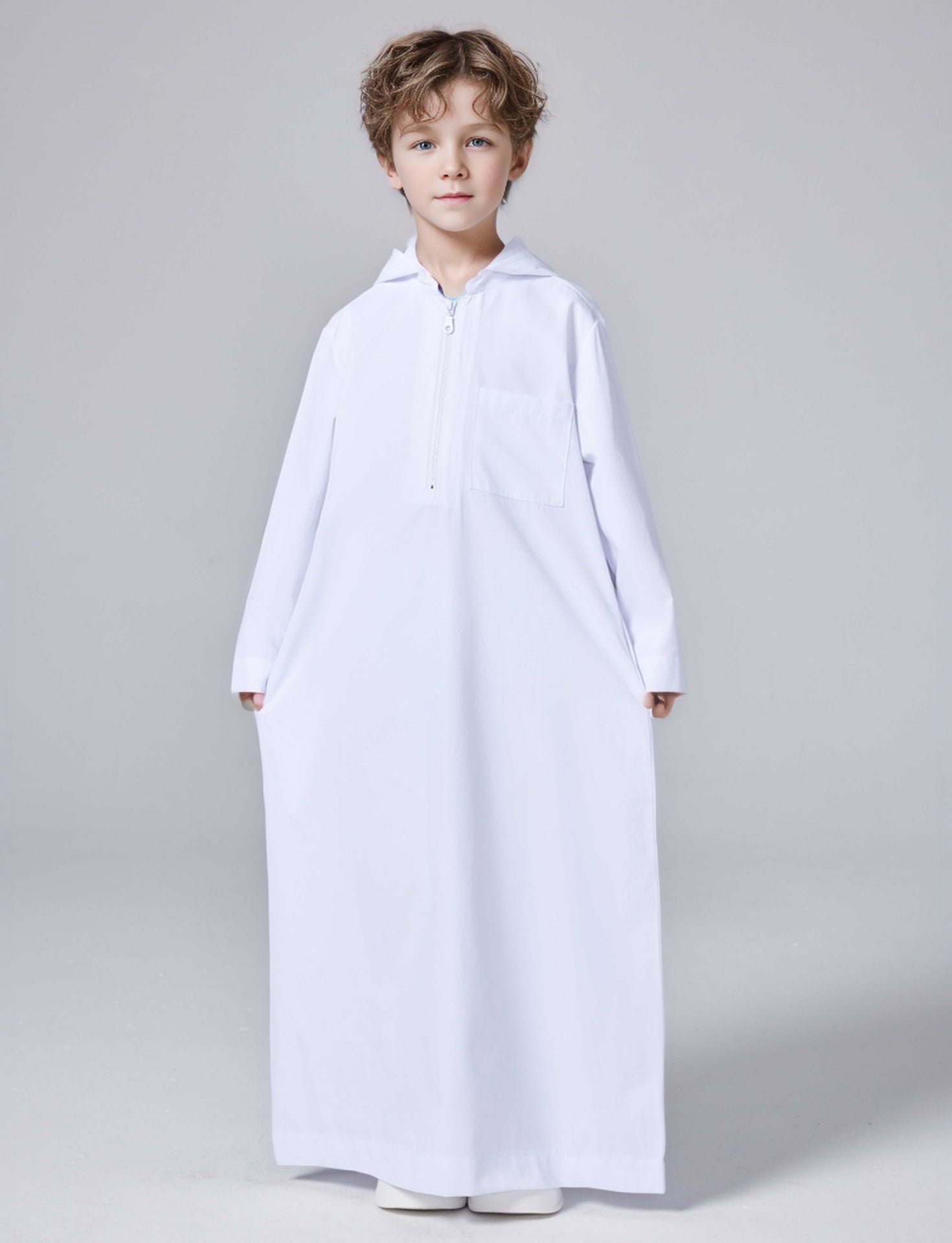 Keep your little one cozy and stylish with our white boys' thobe with hoodie. This Islamic attire is perfect for everyday wear or special occasions. Shop now!