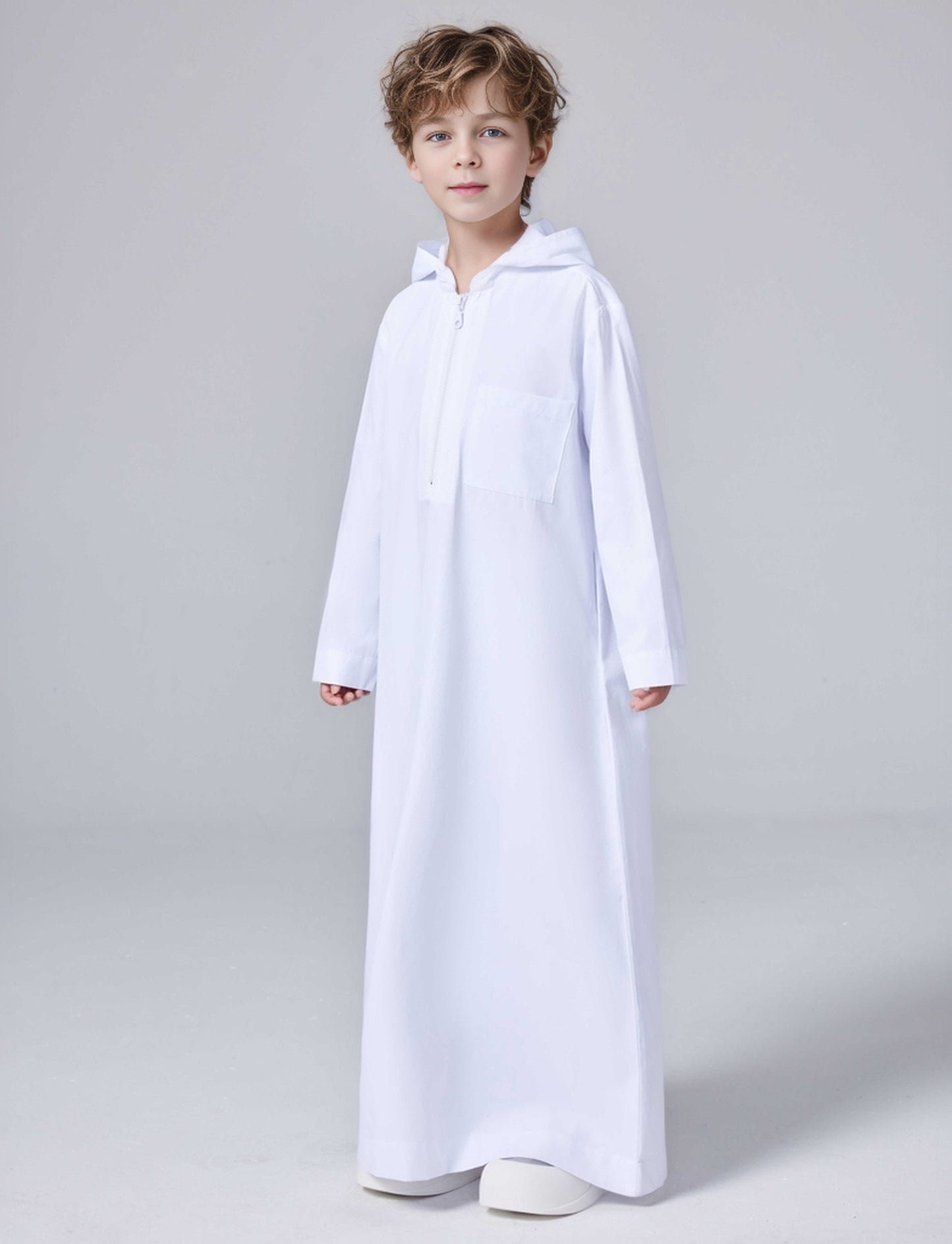 Keep your little one cozy and stylish with our white boys' thobe with hoodie. This Islamic attire is perfect for everyday wear or special occasions. Shop now!