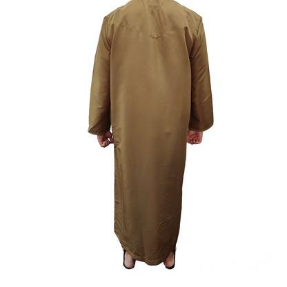 Introducing the Emirati Men's Thobe in Brown, a captivating blend of tradition and modernity available at Hikmah Boutique. Crafted with utmost care, this thobe embodies the timeless elegance Islamic clothing. Our Men's Thobe in Brown is meticulously tailored to provide a comfortable fit for Muslim clothing for men. 