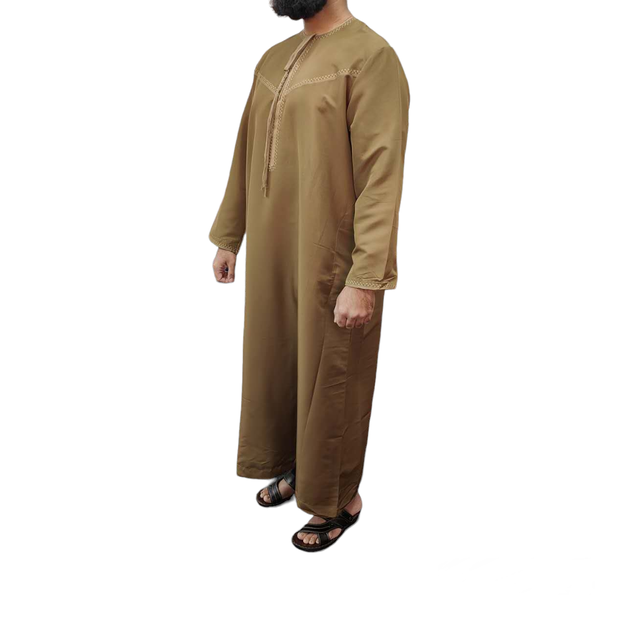 Introducing the Emirati Men's Thobe in Brown, a captivating blend of tradition and modernity available at Hikmah Boutique. Crafted with utmost care, this thobe embodies the timeless elegance Islamic clothing. Our Men's Thobe in Brown is meticulously tailored to provide a comfortable fit for Muslim clothing for men. 