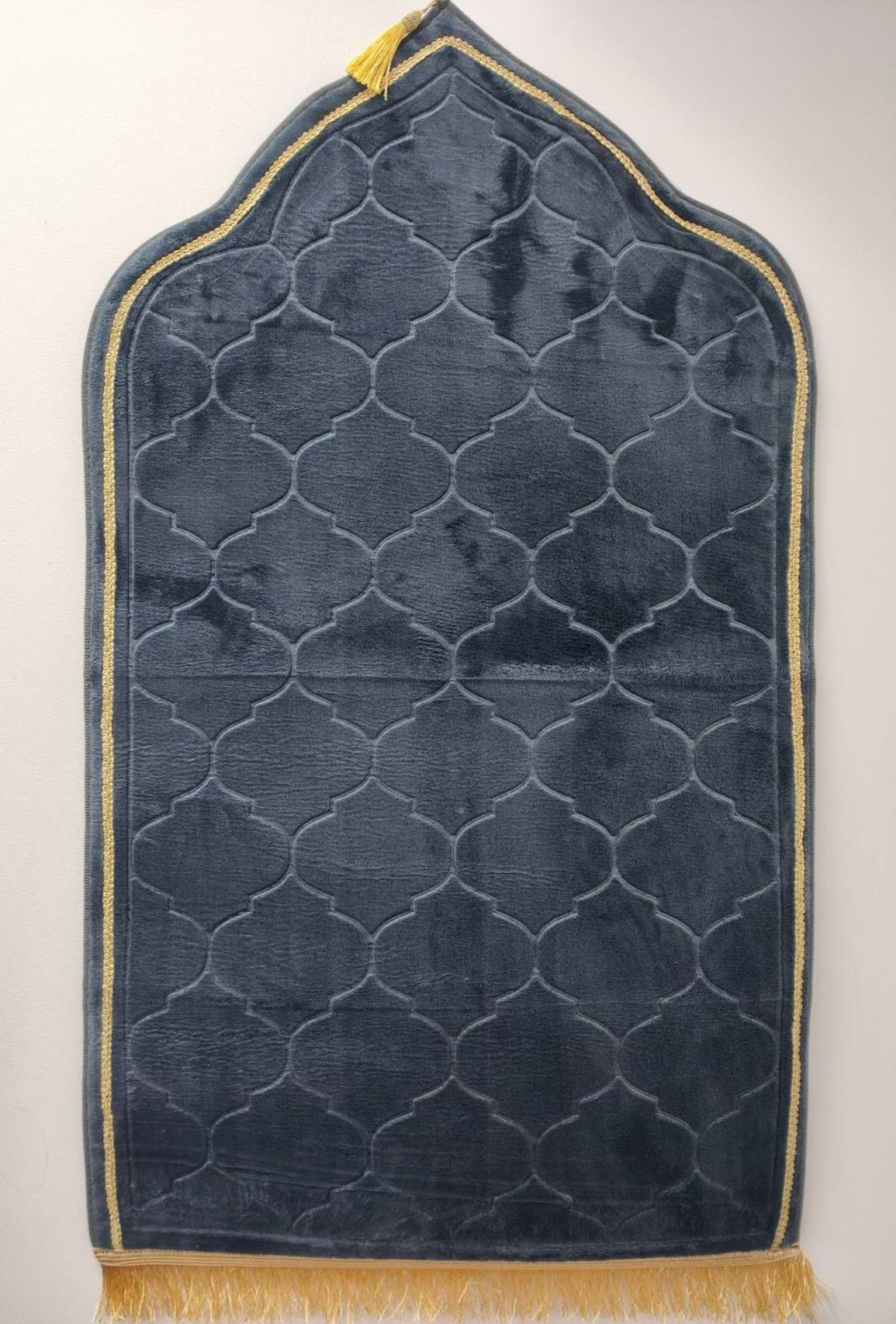 Discover the ultimate comfort with our exclusive Padded Prayer Mat in Charcoal. Made with a luxurious velvety touch, this soft and thick Islamic Prayer Rug offers a comfortable experience for both kids and adults. Elevate your prayer time with its elegant design, exclusively available at Hikmah Boutique.