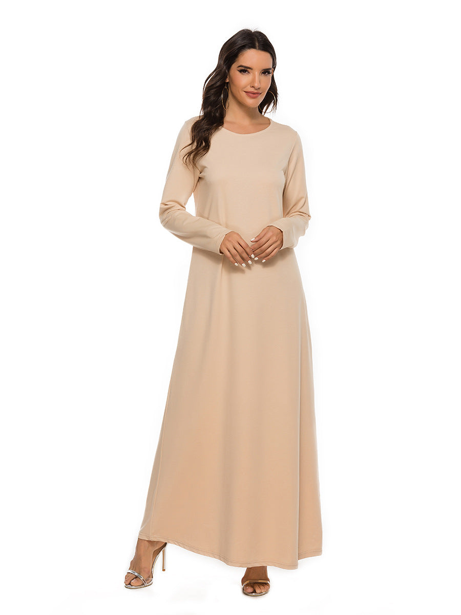 Embrace the purity and simplicity of our peach cotton straight cut abaya with optional belt. This versatile piece is a must-have for any modest summer wardrobe.