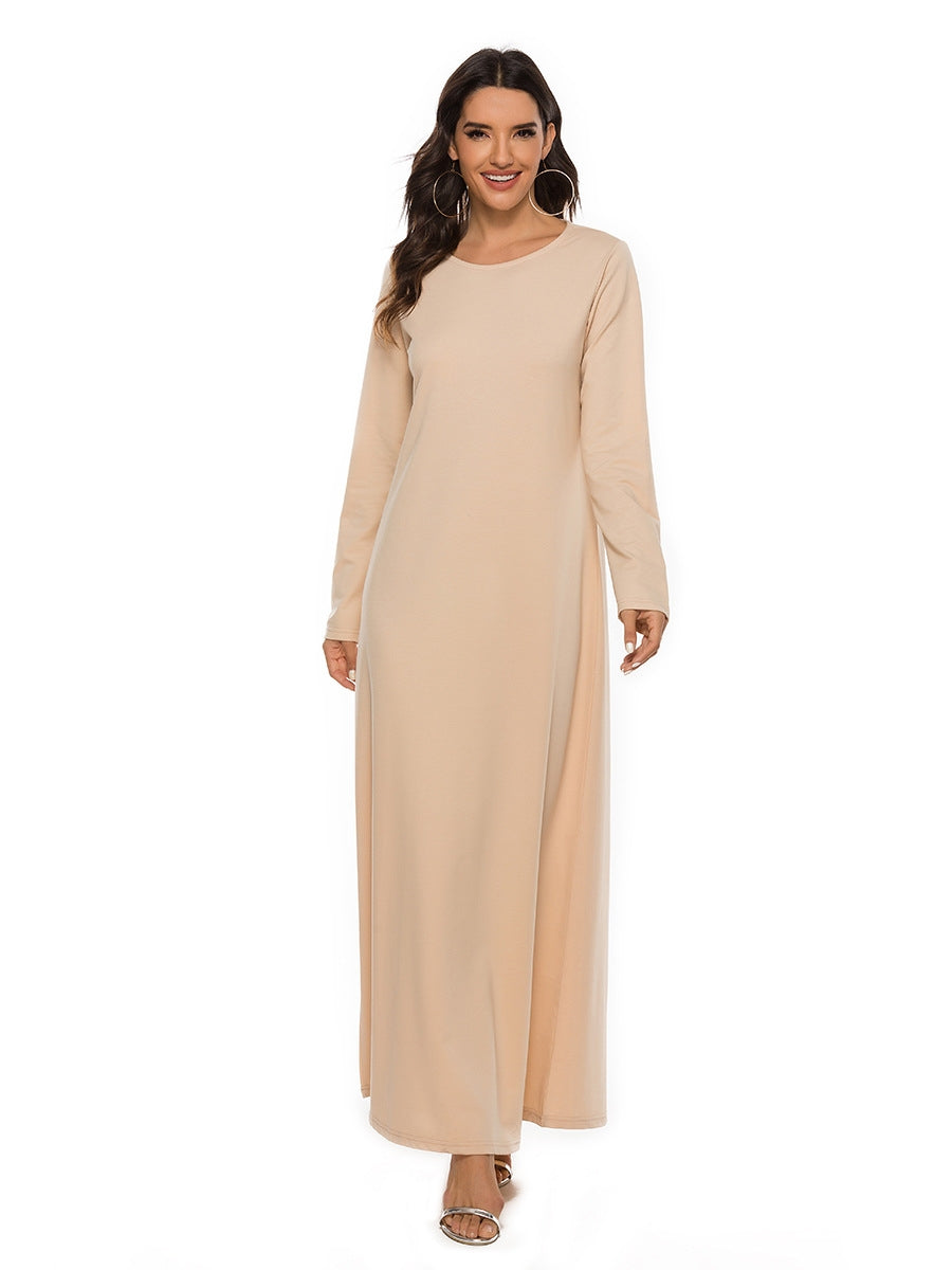 Embrace the purity and simplicity of our peach cotton straight cut abaya with optional belt. This versatile piece is a must-have for any modest summer wardrobe.