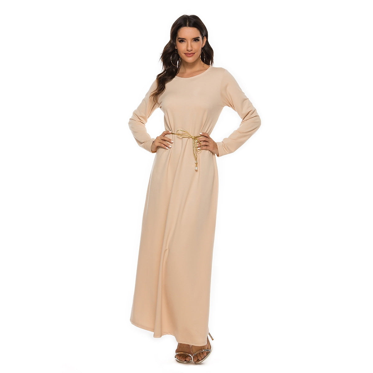 Embrace the purity and simplicity of our peach cotton straight cut abaya with optional belt. This versatile piece is a must-have for any modest summer wardrobe.