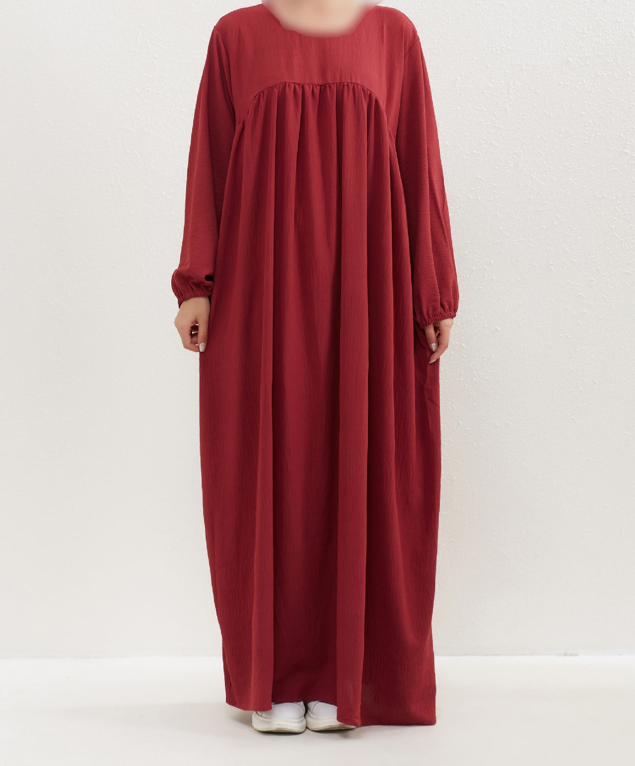 Introducing the Epitome of Modest Clothing: Maroon Crepe Abaya from Hikmah Boutique Elevate your modest wardrobe with our exclusive Maroon Crepe Abaya, meticulously crafted to embody sophistication and grace. Exclusively available at Hikmah Boutique, this stunning piece redefines modest fashion with its unique design.