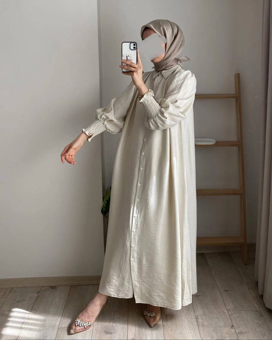 Shop the Crepe Cardigan Abaya in Beige at Hikmah Boutique. This modest abaya offers style and comfort, perfect for any occasion. Buy now online in Australia.