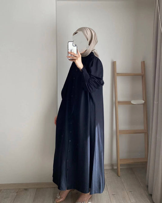 Discover the Crepe Cardigan Abaya in Navy at Hikmah Boutique Australia. Perfect for modern Muslim women, this stylish and modest abaya is available online. Shop now!