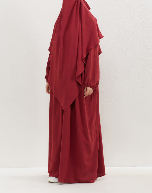 Introducing our esteemed Crepe Double Layer Khimar in Maroon, exclusively presented at Hikmah Boutique. With meticulous care and devotion, this khimar has been crafted to elevate your modesty in the divine light. Fashioned from the finest crepe fabric to help you strive in your modesty. 