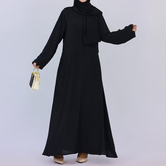 Discover timeless elegance with our exquisite Crepe Plain Abaya. Crafted from premium quality crepe fabric, this modest abaya is the epitome of sophistication.