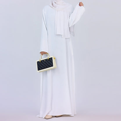 Discover pure elegance with our White Crepe Abaya. This plain, modest abaya is perfect for everyday wear or special occasions. Crafted from luxurious crepe, it offers comfort and style. Find your perfect white abaya online now.