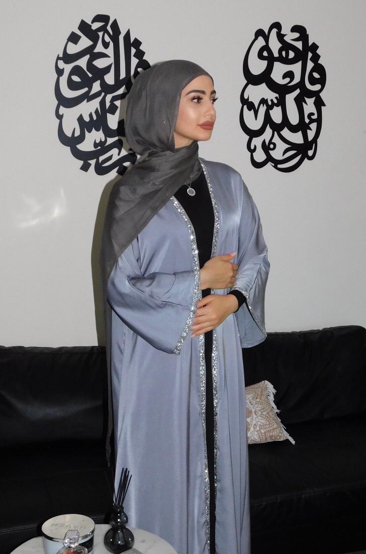 Elevate your Eid festive ensemble with the Satin Open Abaya from Hikmah Boutique. Crafted with premium satin fabric and delicate decorative borders, this exquisite abaya exudes modest elegance, perfect for celebrating Eid with grace and sophistication. Available in all sizes. 