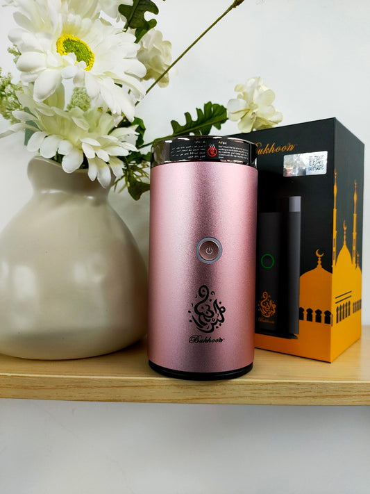 Elevate your senses with our Electric Bakhoor Burner in Pink from Hikmah Boutique. Crafted with precision and elegance, this electric bakhoor burner burns your favourite bakhoor wirelessly filled the air with beautiful scents of bakhoor without the hassle of burning charcoal. Indulge in the enchanting aromas of bakhoor.