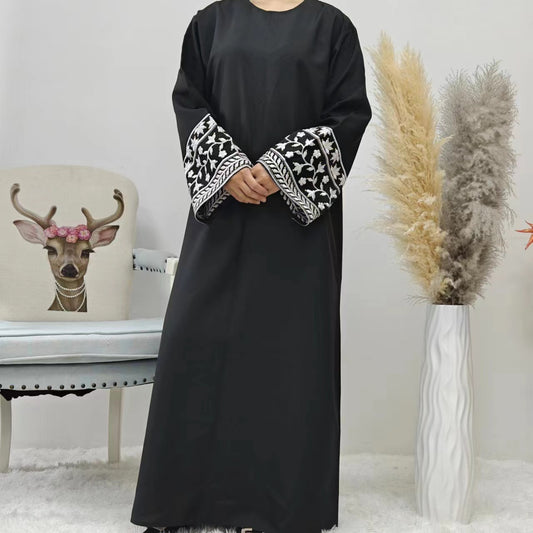 Discover the elegance of our Islamic black abaya with embroidered sleeves. This exquisite piece is perfect for any modest occasion. Shop now at Hikmah Boutique Sydney.