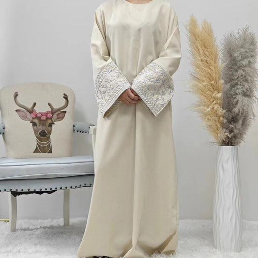 Discover the elegance of our cream waffle abaya with embroidered sleeves. This exquisite Modest Clothing piece is perfect for any occasion. Shop now at Hikmah Boutique Sydney.