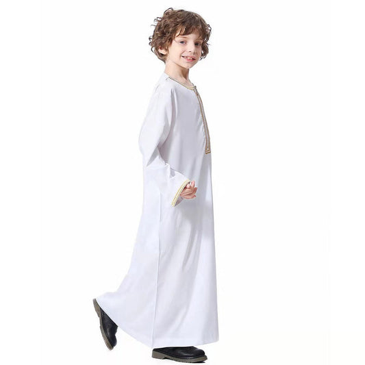 Dress your son in elegance with our white embroidered boys' thobe. Perfect for special occasions, this modest clothing thobe is a must-have for every young boy. Shop now at Hikmah Boutique Australia.