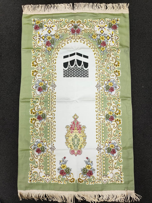 Introducing the epitome of comfort and elegance, our Embroidered Prayer Rug in Green is an absolute must-have for your sacred moments. Exclusively crafted by Hikmah Boutique, this prayer rug encapsulates the essence of tradition with a touch of modern luxury.