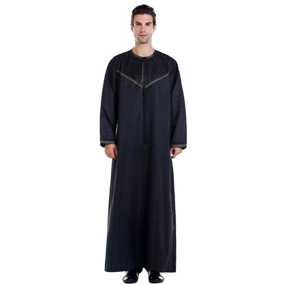 Introducing the Emirati Men's Thobe in Black by Hikmah Boutique, a captivating and versatile Modest Thobe that effortlessly combines Islamic elegance with Modest style. This meticulously crafted thobe is designed to enhance your appearance and offer unrivaled comfort, making it a perfect choice for any occasion.